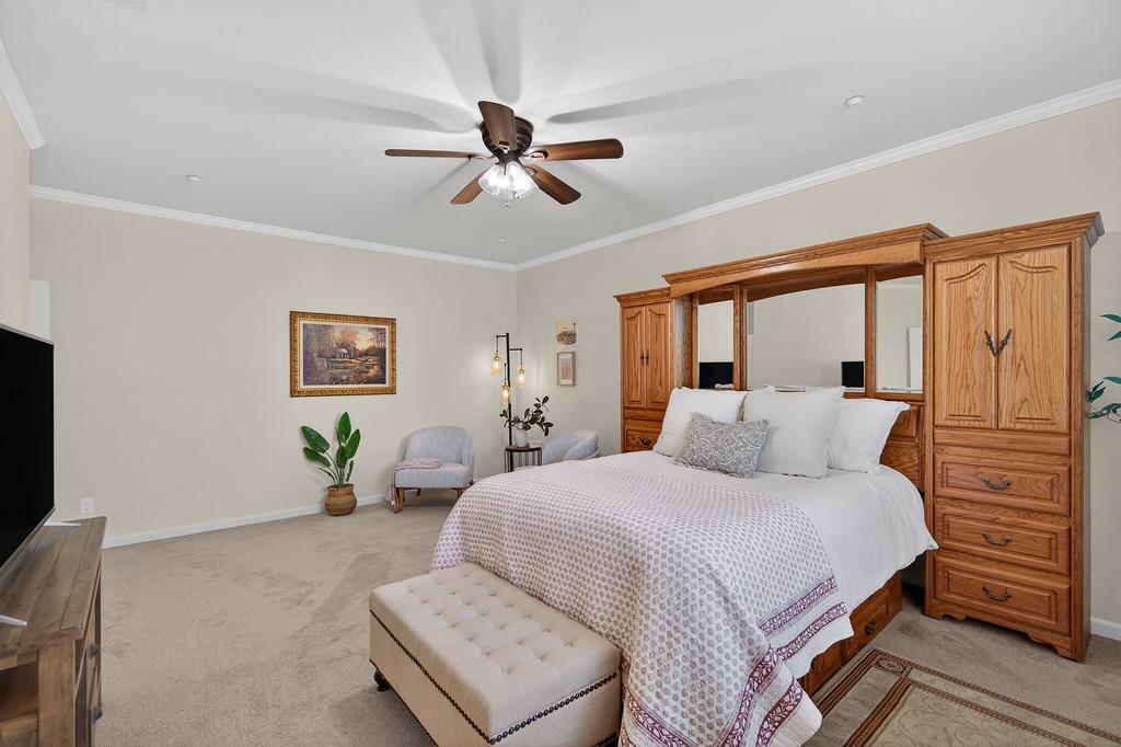 5409 Mill Water Circle Rancho Cordova, CA 95742 - Photo 33 of 48 a bedroom with a bed and wooden floor