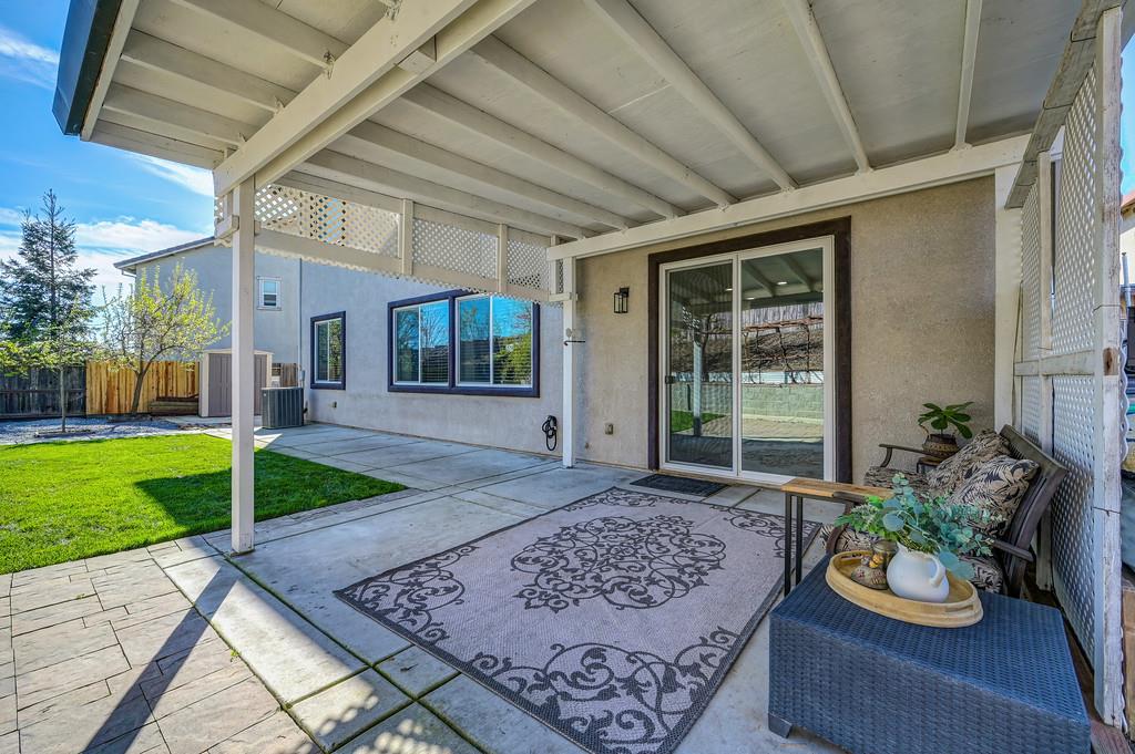 5409 Mill Water Circle Rancho Cordova, CA 95742 - Photo 36 of 48 a view of an entryway door and garden