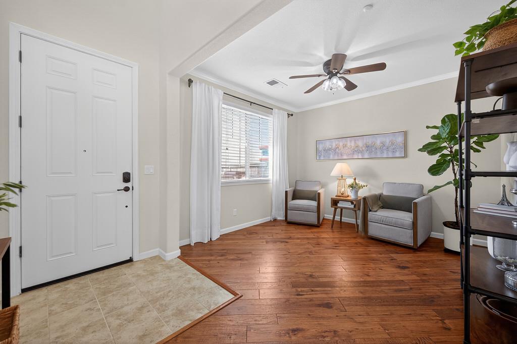 5409 Mill Water Circle Rancho Cordova, CA 95742 - Photo 9 of 48 a living room with furniture and a chandelier
