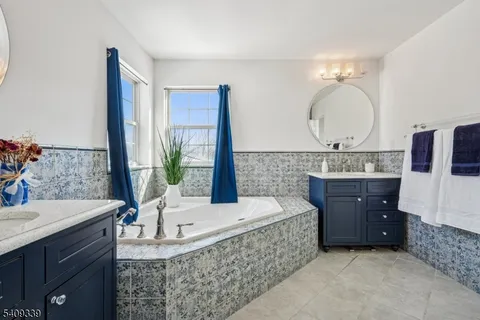 a living room with a couch and a dresser