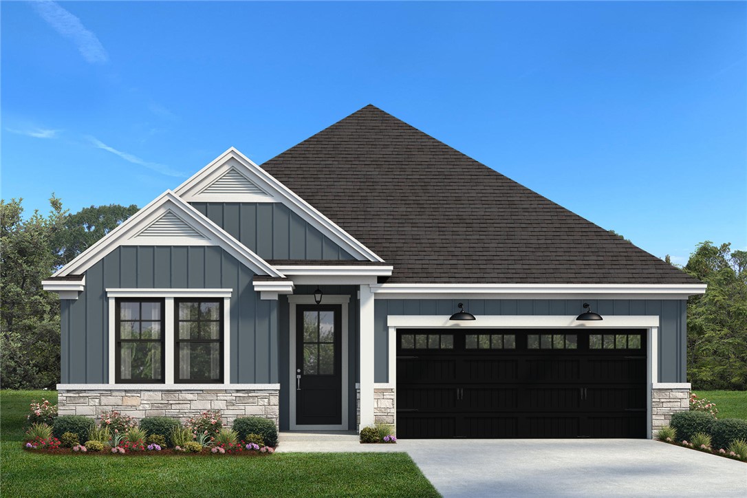 306 Bluestem Court Anderson, SC 29621 - Photo 1 of 1 A charming exterior with striking blue siding and inviting stone accents.