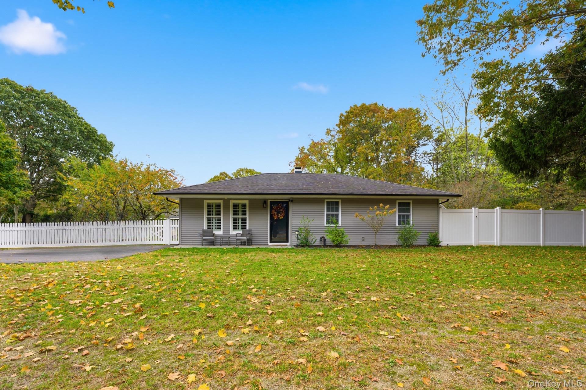 130 Beaver Dam Road Brookhaven, NY 11719 - Photo 1 of 15 a view of a house with a yard