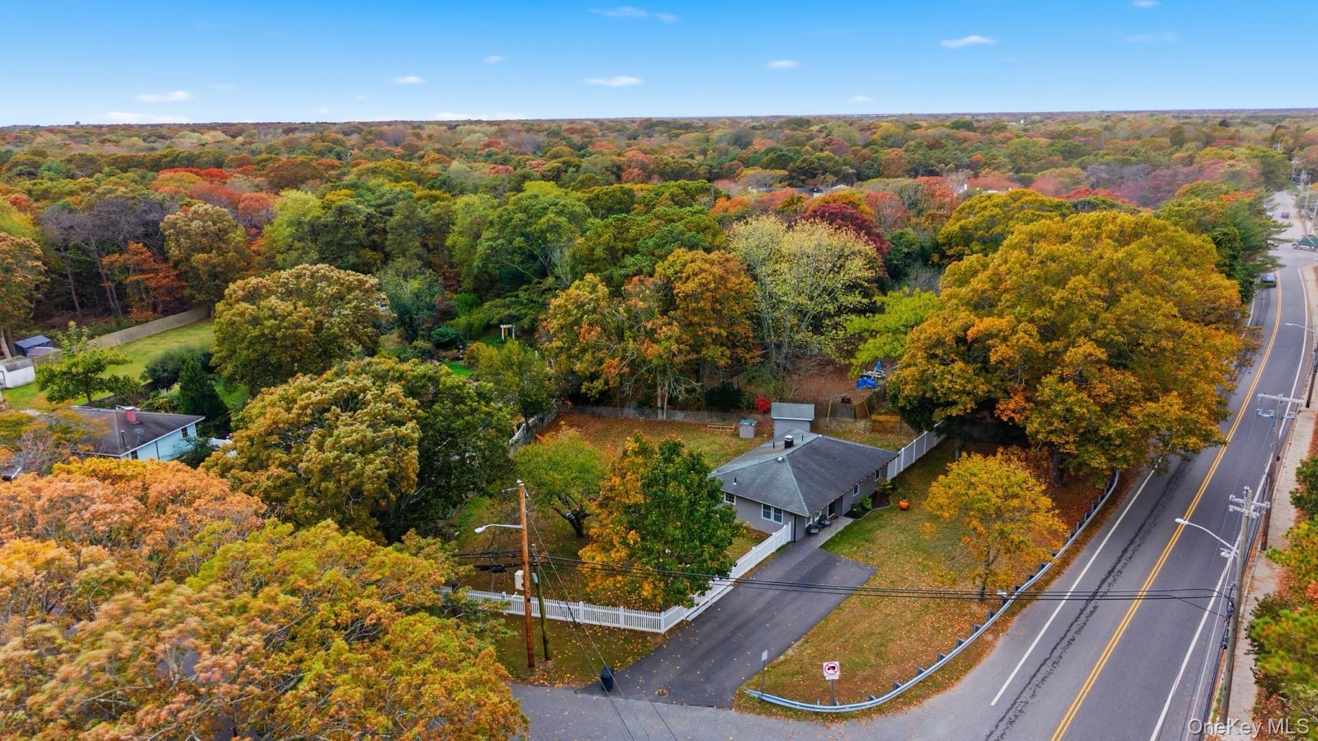 130 Beaver Dam Road Brookhaven, NY 11719 - Photo 14 of 15 an aerial view of residential houses with outdoor space