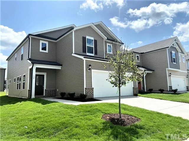 a house view with a garden space