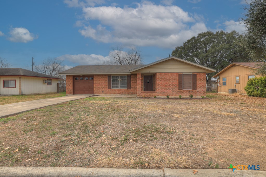 217 Gruene Road New Braunfels, TX 78130 - Photo 2 of 25 a front view of a house with a garden