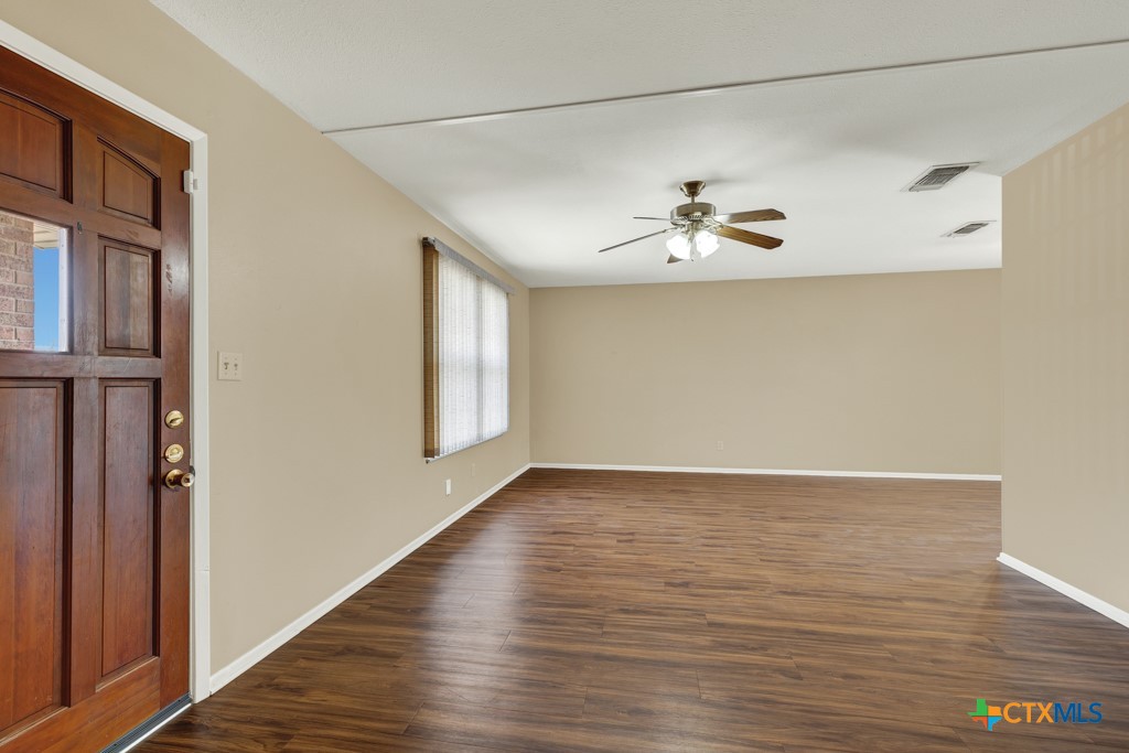 217 Gruene Road New Braunfels, TX 78130 - Photo 4 of 25 a view of an empty room with a window