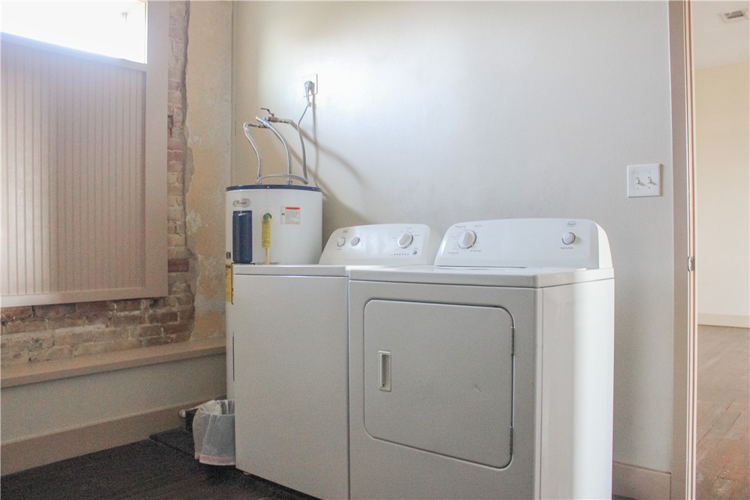 205 South Main Street Caldwell, TX 77836 - Photo 11 of 12 a utility room with dryer and washer