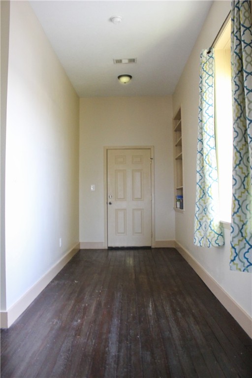 205 South Main Street Caldwell, TX 77836 - Photo 2 of 12 a view of an empty room and window