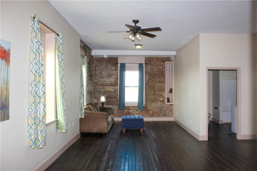 205 South Main Street Caldwell, TX 77836 - Photo 4 of 12 a living room with furniture and a large window