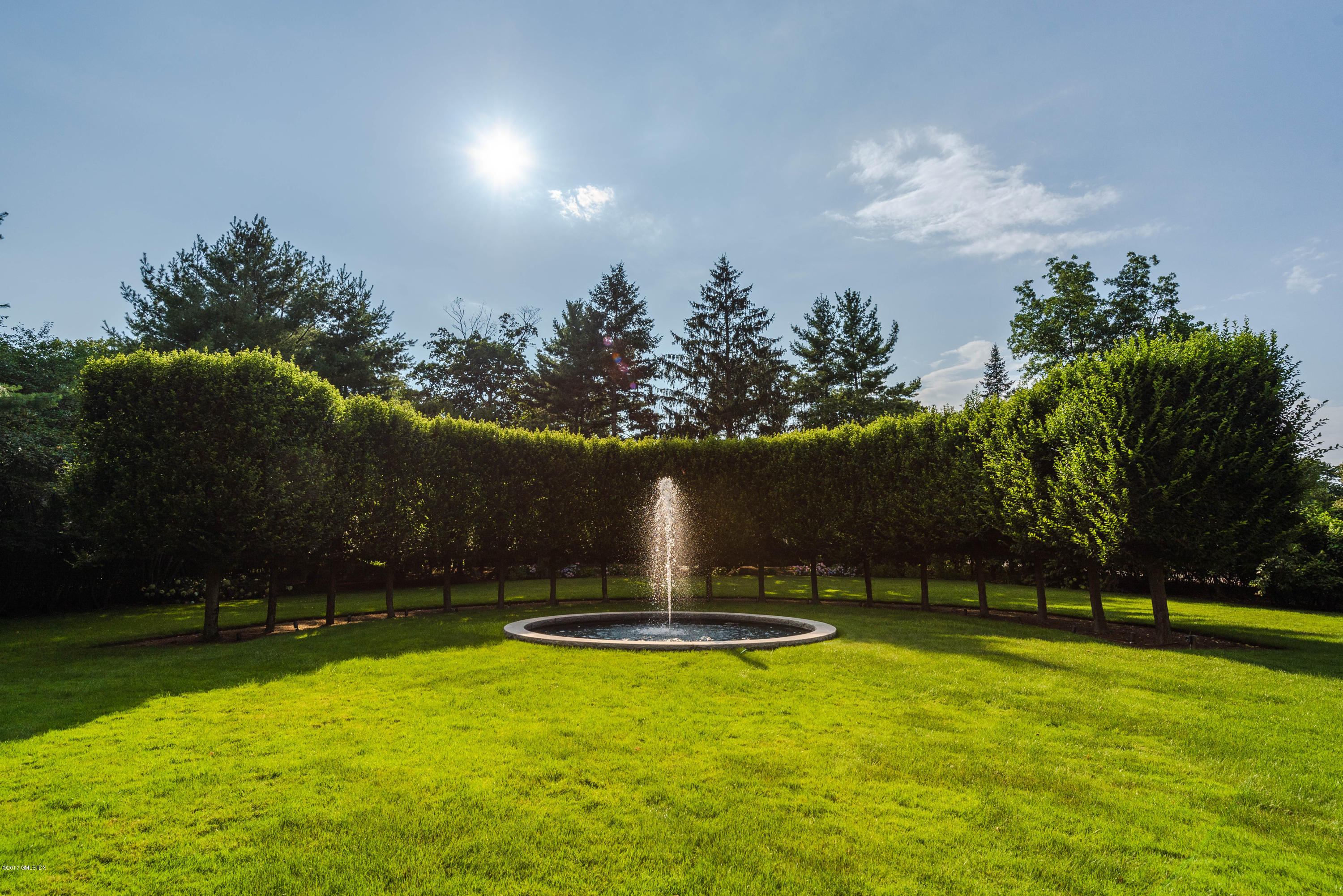 147 Byram Shore Road Greenwich, CT 06830 - Photo 15 of 19 a view of swimming pool with an outdoor space and seating area