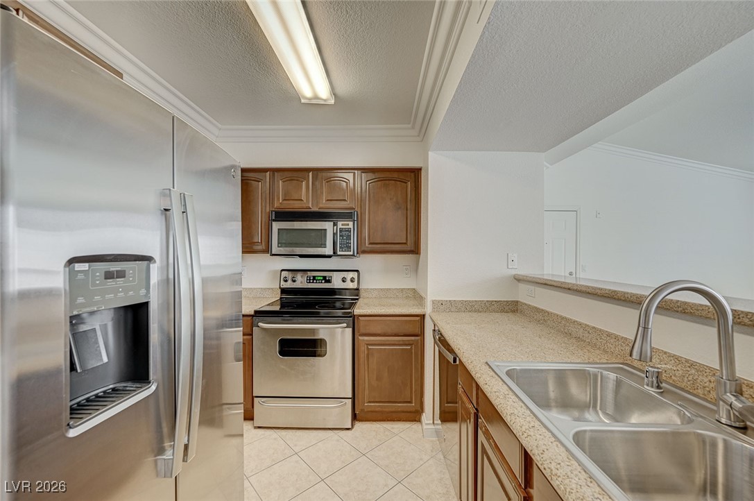 Granite with Stainless Steel Appliances with a pantry