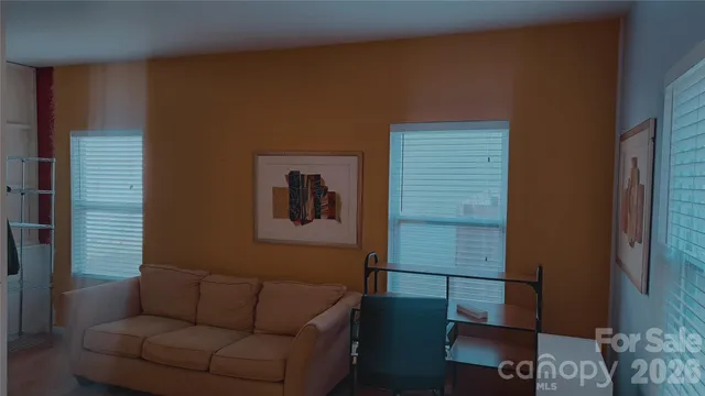 a view of a livingroom with furniture and a couch