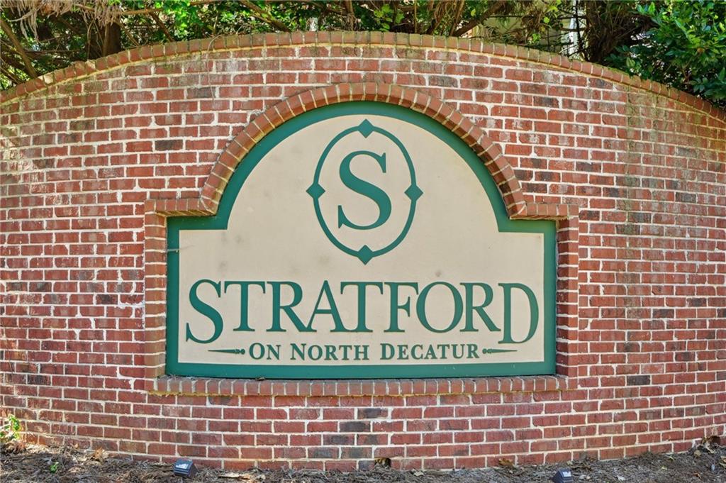 1107 Stratford Commons Decatur, GA 30033 - Photo 1 of 1 a sign that is on top of a building