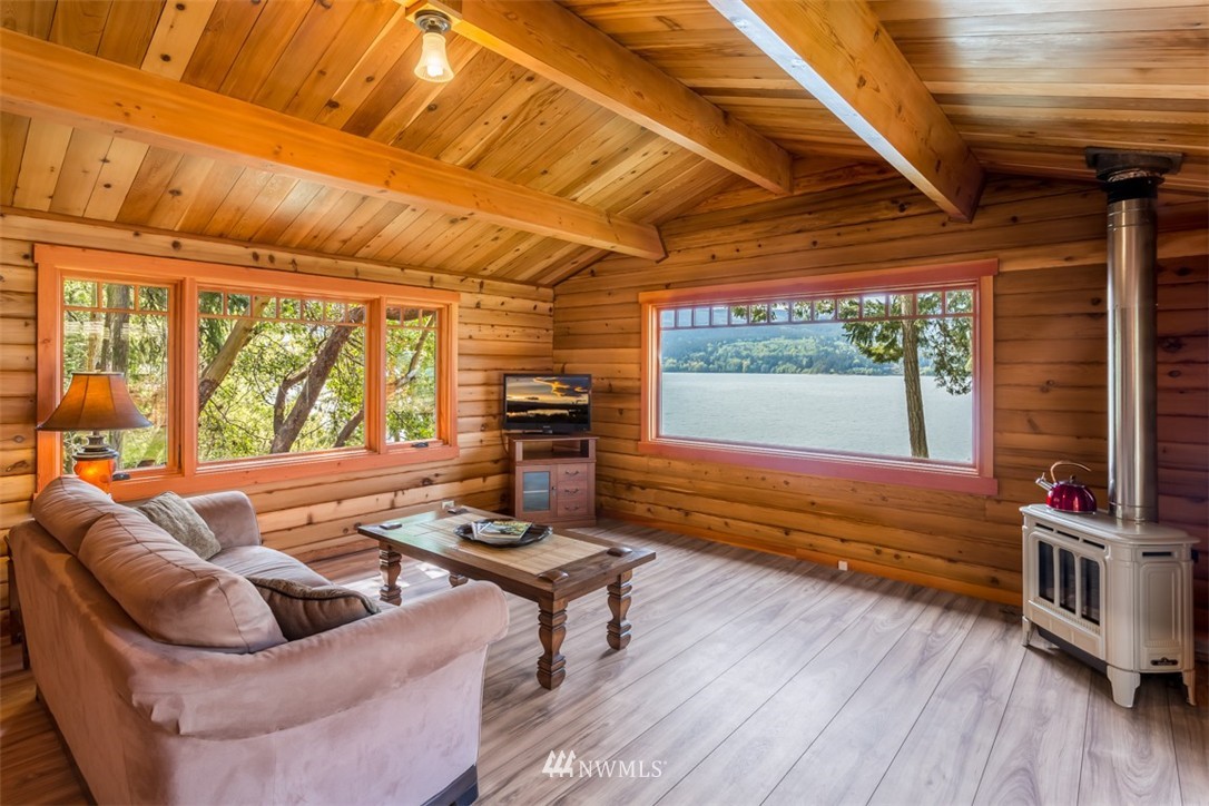 1485 East Sequim Bay Road Sequim, WA 98382 - Photo 20 of 25 a bedroom with furniture and a large window