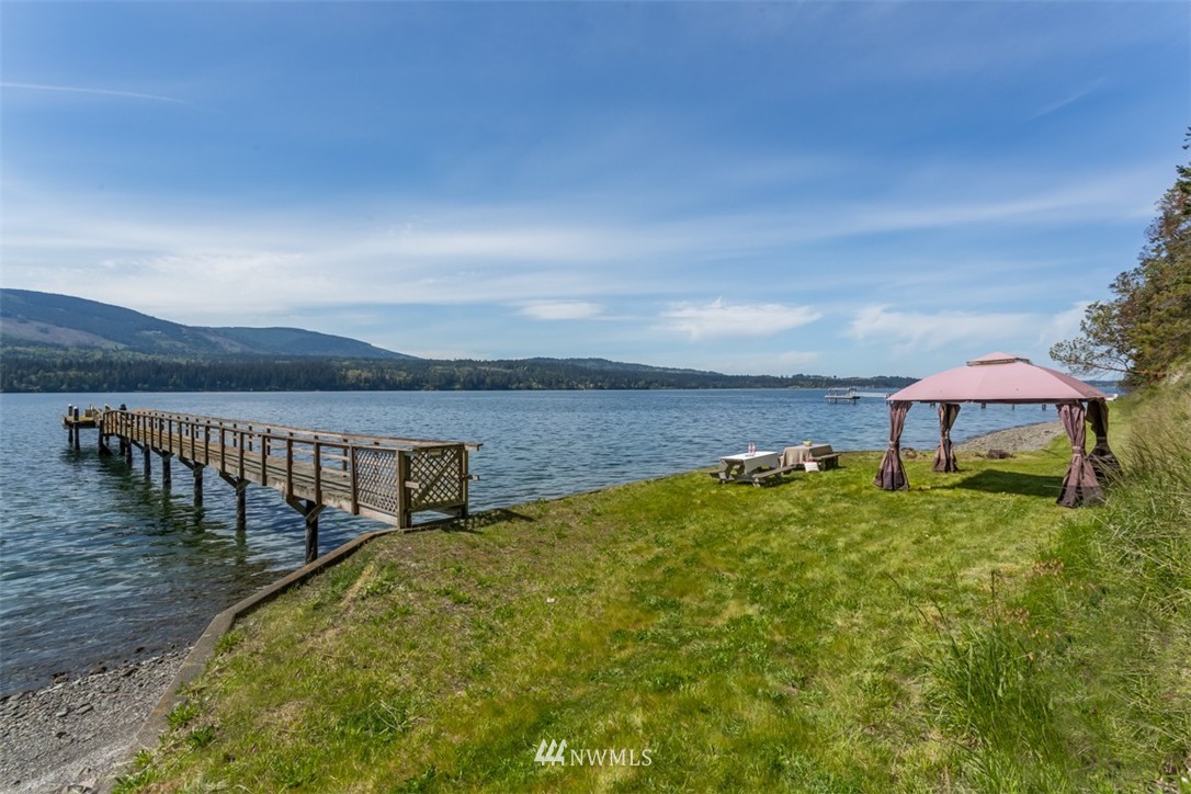 1485 East Sequim Bay Road Sequim, WA 98382 - Photo 25 of 25 a view of a terrace with chairs