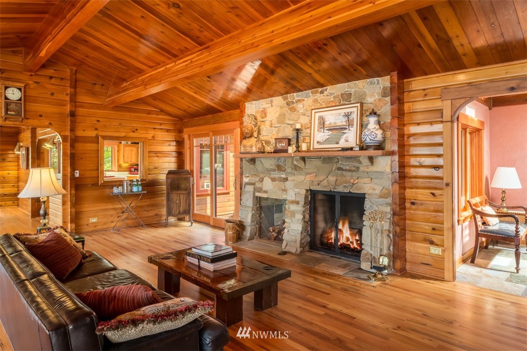 1485 East Sequim Bay Road Sequim, WA 98382 - Photo 7 of 25 a living room with furniture and a fireplace