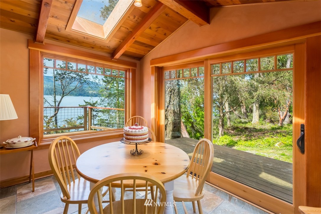 1485 East Sequim Bay Road Sequim, WA 98382 - Photo 10 of 25 a view of a dining room with furniture window and outside view