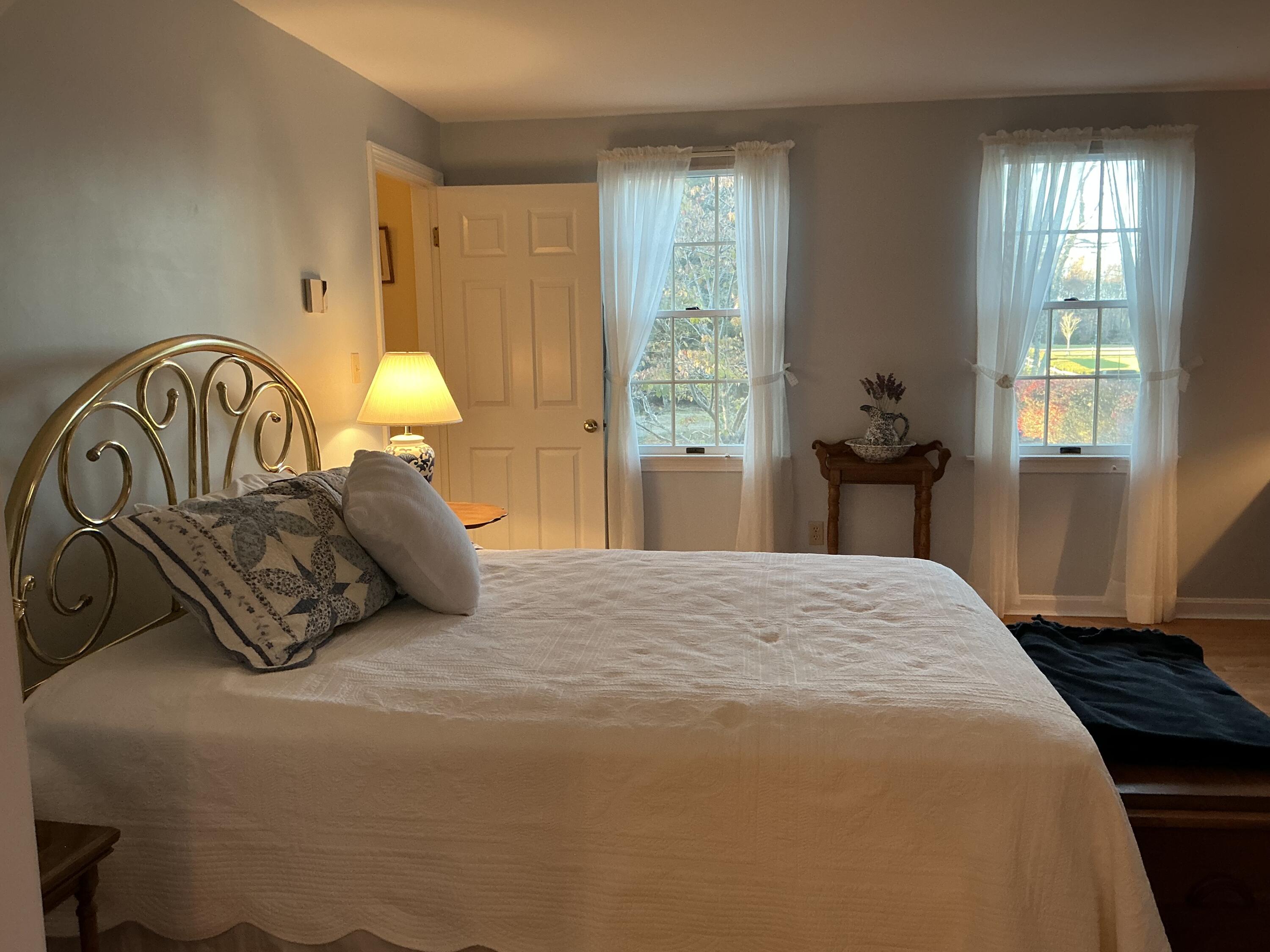 544 Cotuit Road Marstons Mills, MA 02648 - Photo 19 of 52 a bedroom with a bed and a window