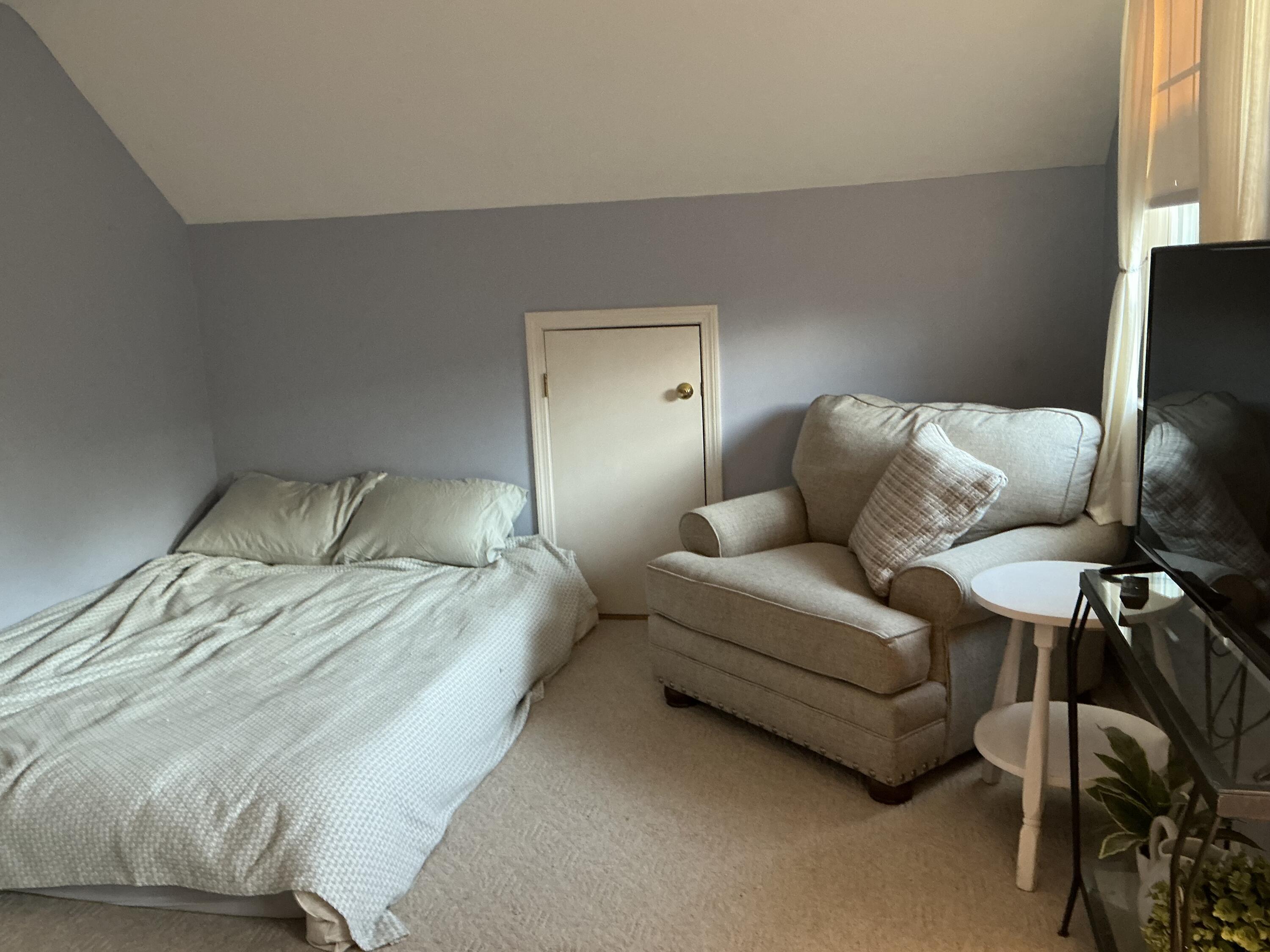 544 Cotuit Road Marstons Mills, MA 02648 - Photo 31 of 52 a bed room with a bed and a couch