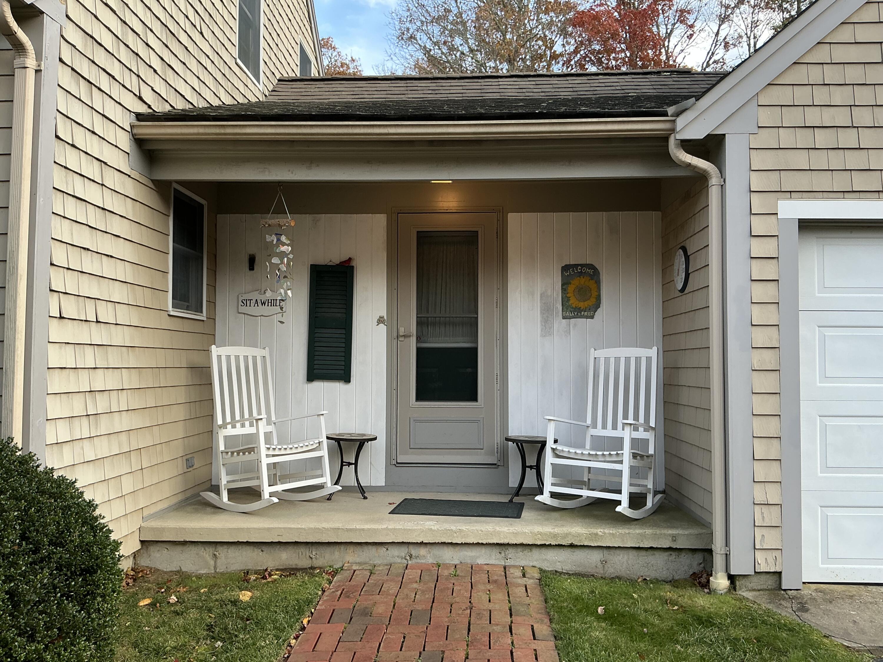 544 Cotuit Road Marstons Mills, MA 02648 - Photo 4 of 52 a front view of a house with stairs
