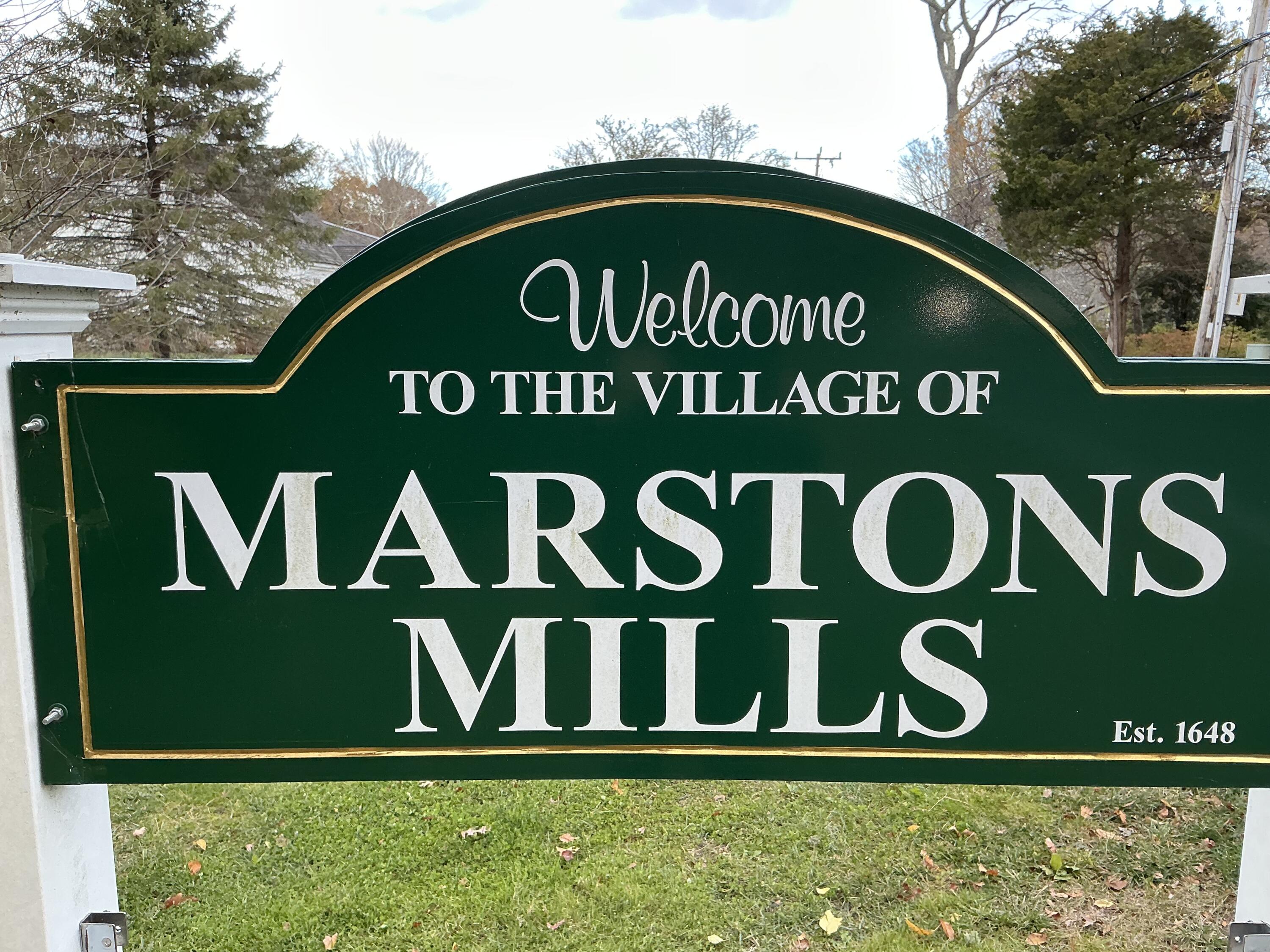 544 Cotuit Road Marstons Mills, MA 02648 - Photo 52 of 52 a sign that is on the side of the road