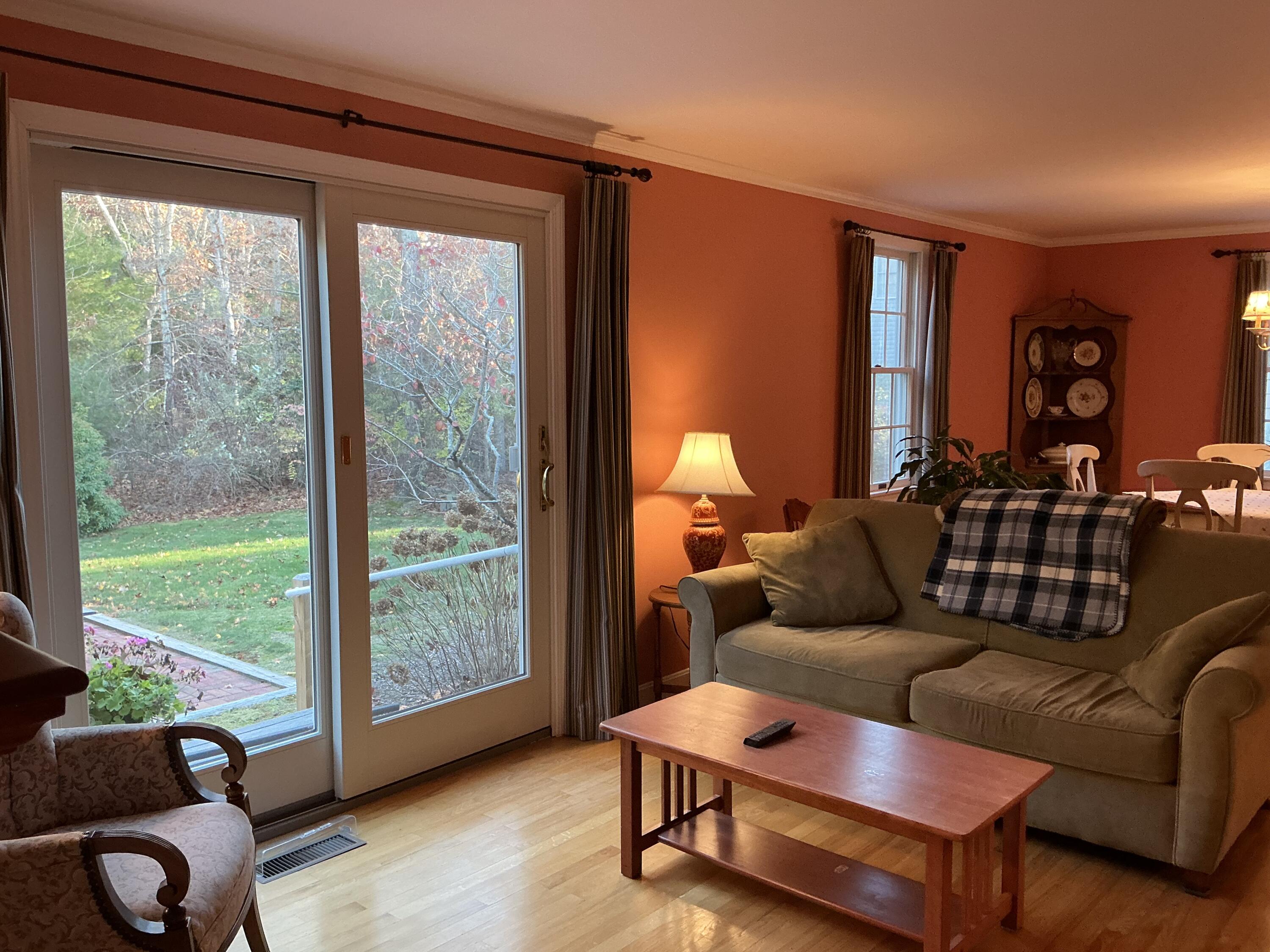 544 Cotuit Road Marstons Mills, MA 02648 - Photo 9 of 52 a living room with furniture and a large window