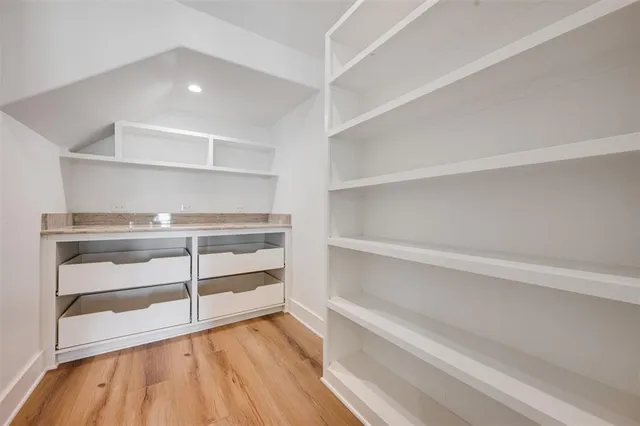 a view of an empty walk in closet