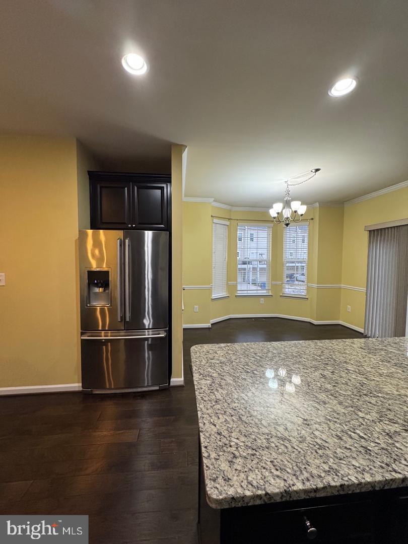 7925 Alchemy Way Elkridge, MD 21075 - Photo 30 of 46 a view of kitchen with refrigerator and window