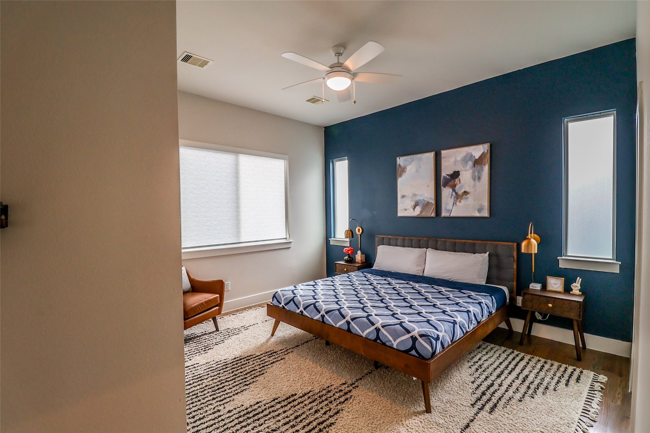 2306 Wipprecht Street Houston, TX 77020 - Photo 19 of 29 a bedroom with a bed rug and wooden floor