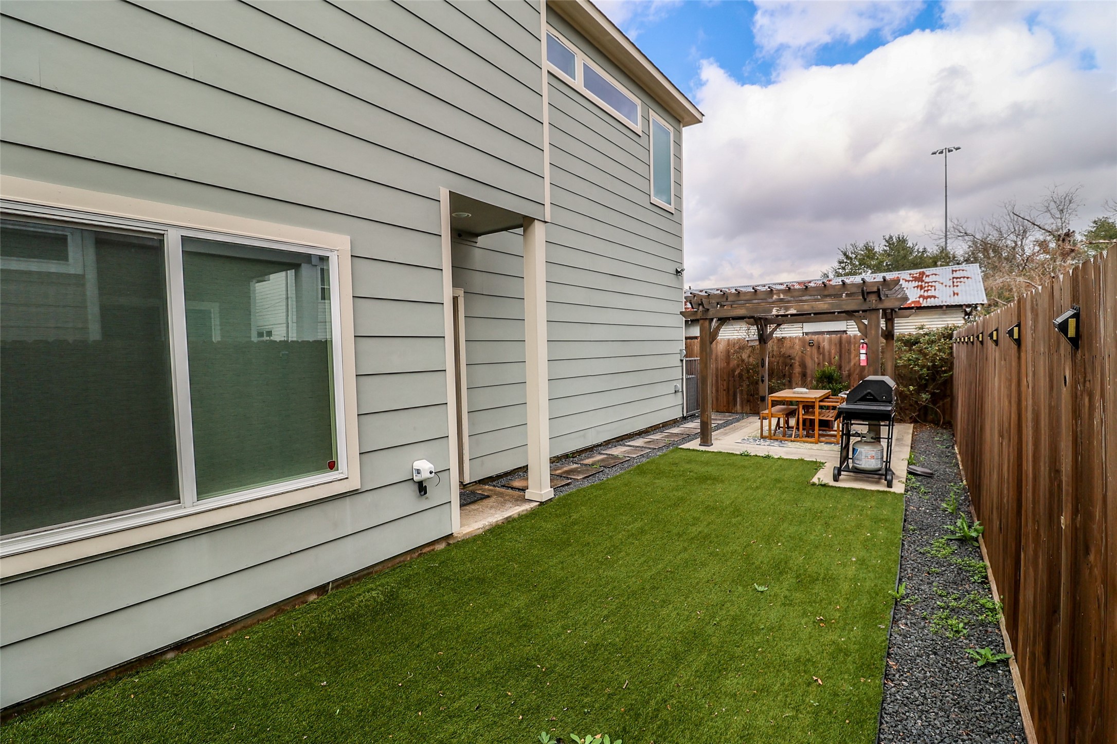2306 Wipprecht Street Houston, TX 77020 - Photo 27 of 29 a view of a backyard with sitting area and garden