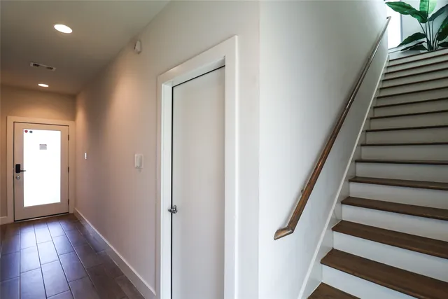 a large kitchen with lots of counter space and living room