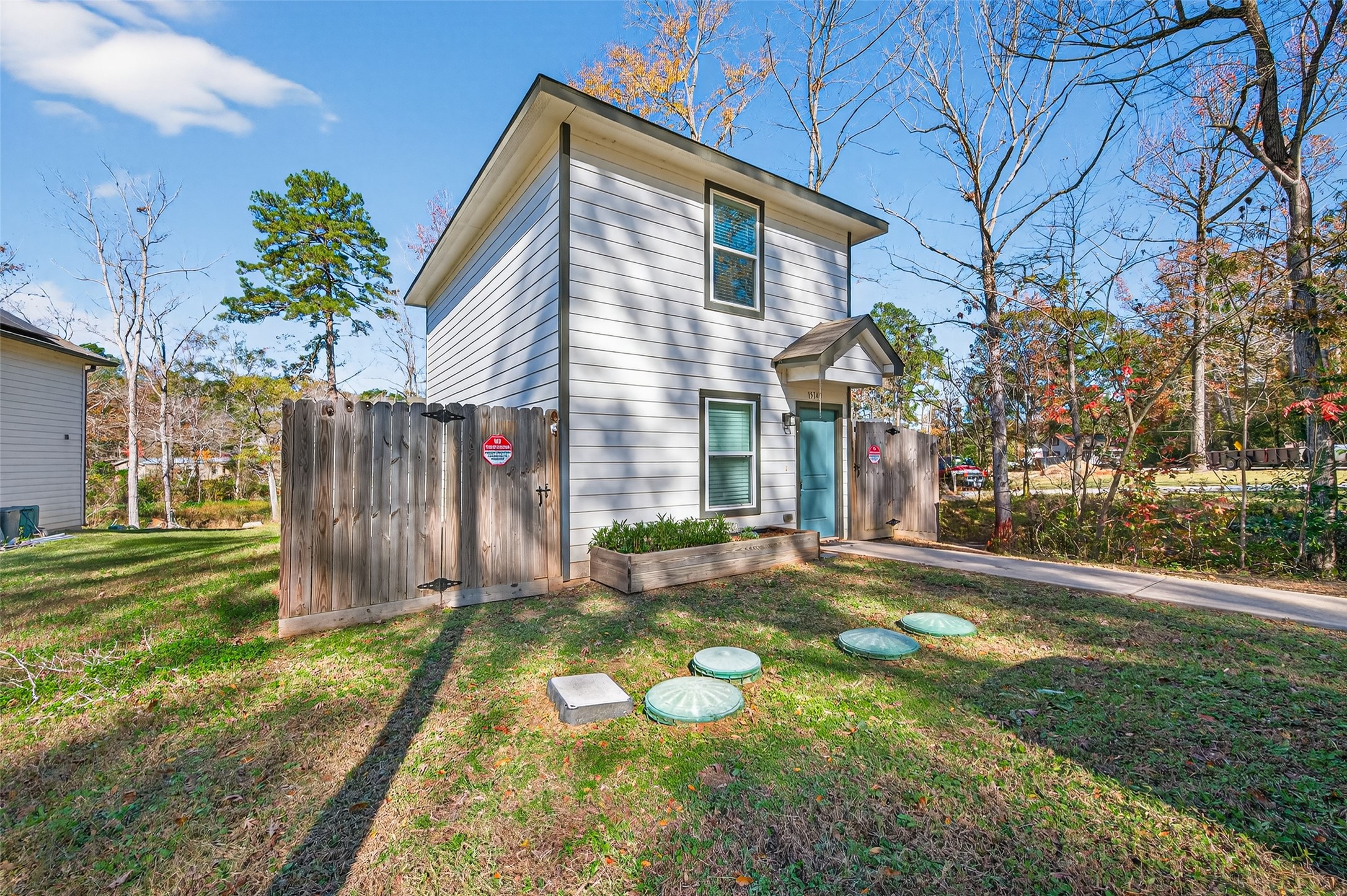 15149 Austin Road Willis, TX 77378 - Photo 1 of 31 a view of a yard in front of house