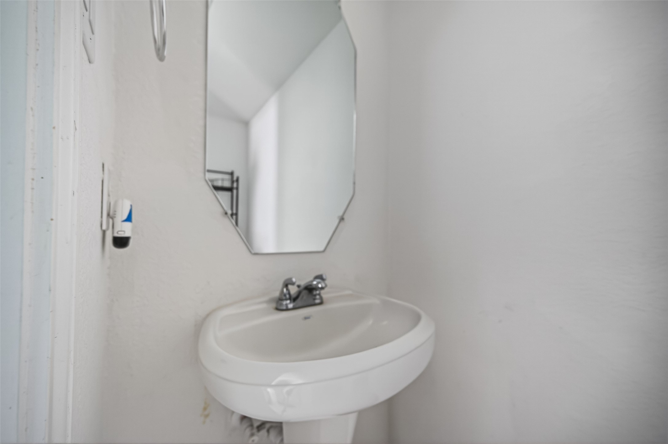 15149 Austin Road Willis, TX 77378 - Photo 16 of 31 a bathroom with a sink and a mirror