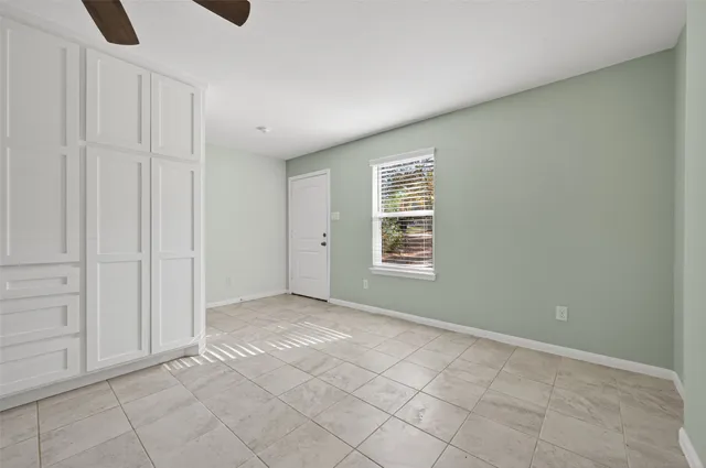 an empty room with windows