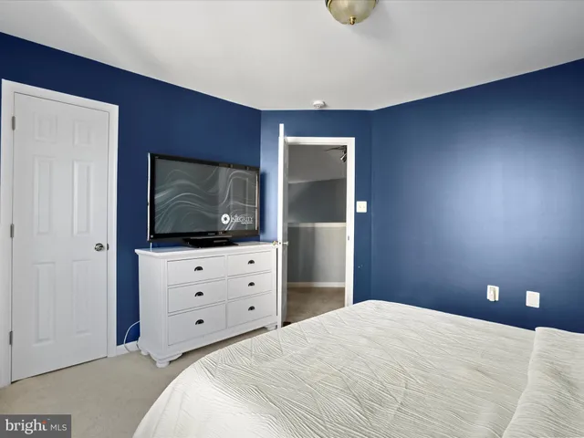 a view of a chairs and table in the balcony