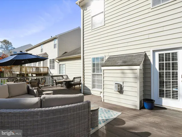 a bathroom with a sink toilet a mirror and shower