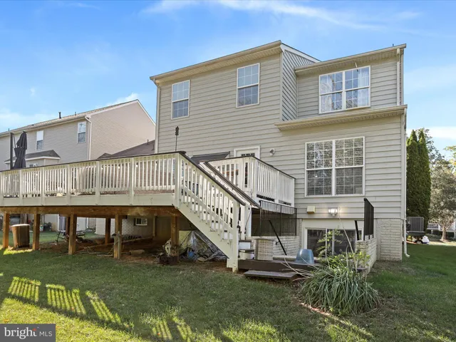 a bedroom with furniture and a bed