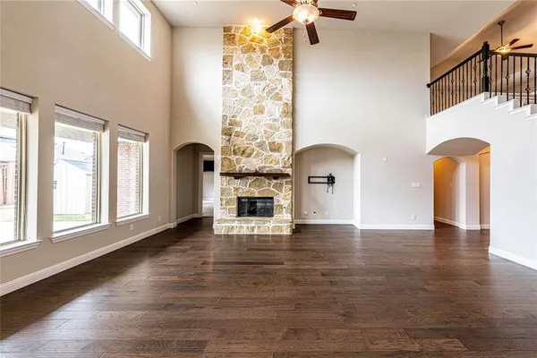 a kitchen with stainless steel appliances granite countertop a sink and a stove