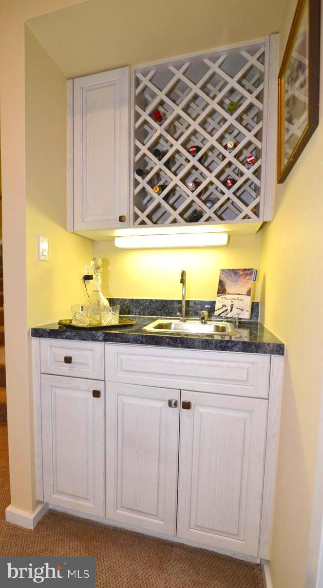 11518 Hemingway Drive Reston, VA 20194 - Photo 49 of 66 Your lower level features a useful full wet bar