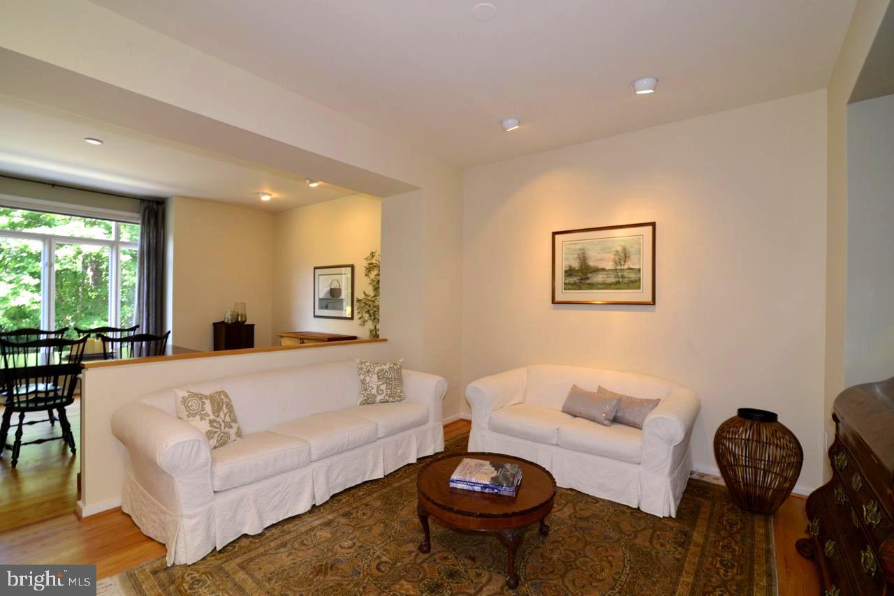 11518 Hemingway Drive Reston, VA 20194 - Photo 9 of 66 The formal living room welcomes people in