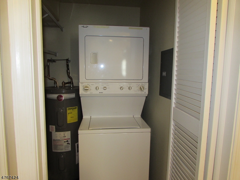 8 Genoble Road Montville, NJ 07045 - Photo 12 of 12 a utility room with dryer and washer