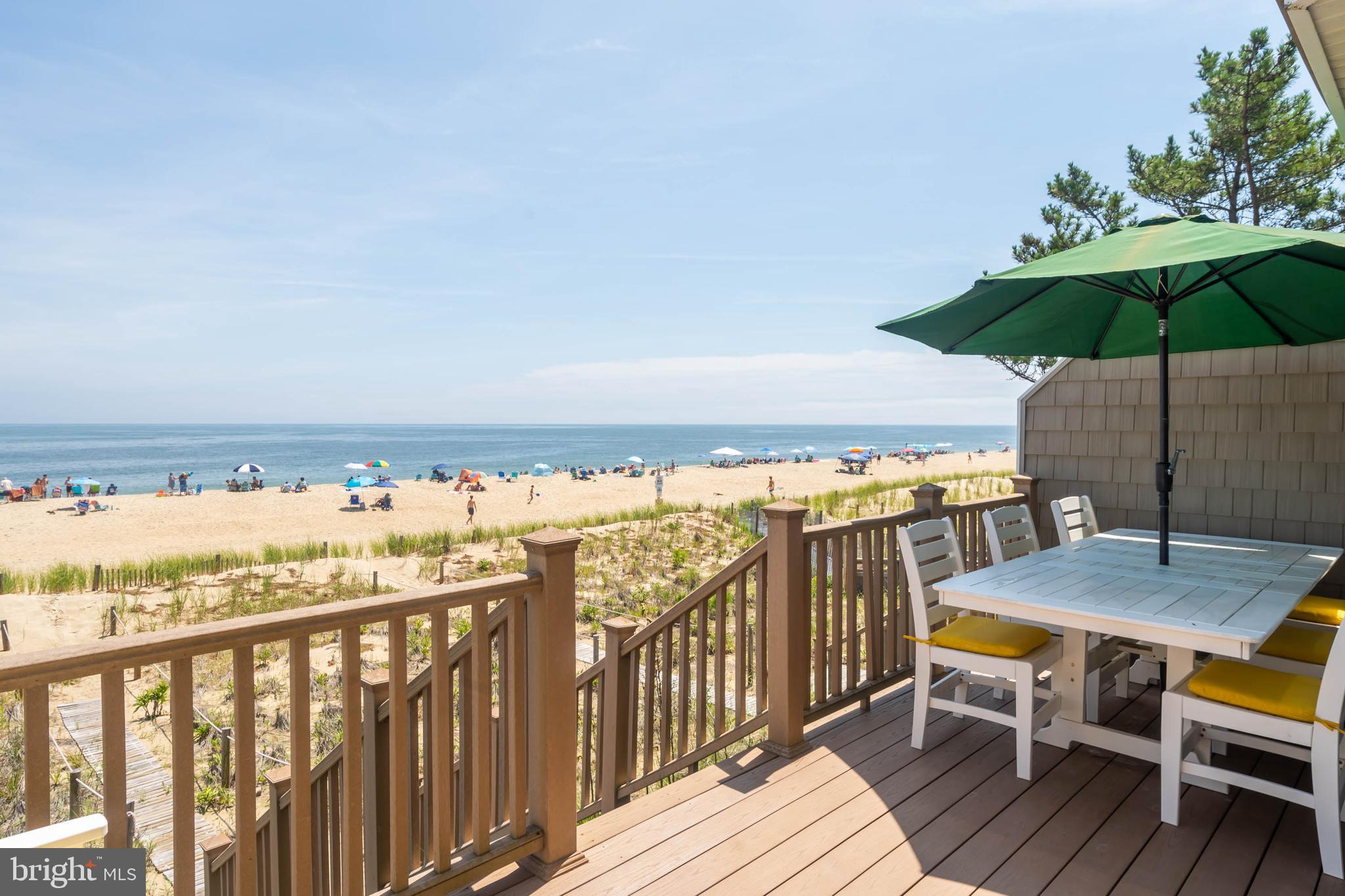 29155 Ocean Road, Unit 4 Bethany Beach, DE 19930 - Photo 13 of 63 Deck with Dining Table