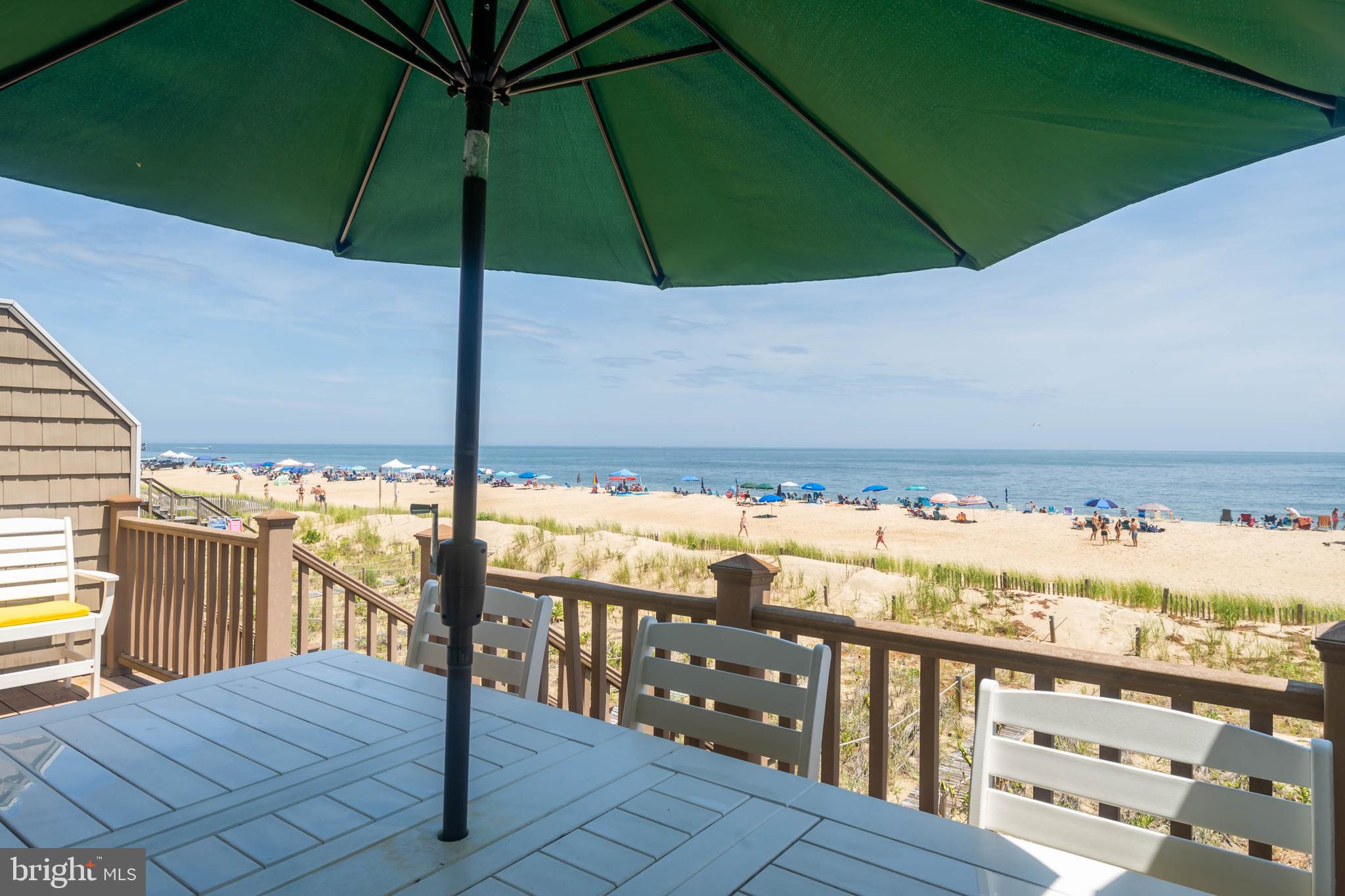 29155 Ocean Road, Unit 4 Bethany Beach, DE 19930 - Photo 14 of 63 Dining table with views of ocean