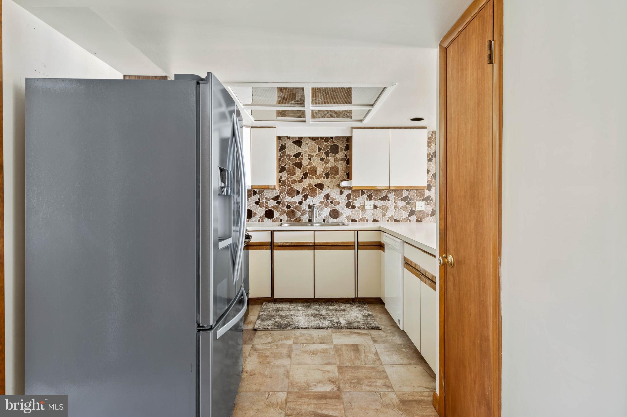 29155 Ocean Road, Unit 4 Bethany Beach, DE 19930 - Photo 22 of 63 Brand new Stainless Refrigerator