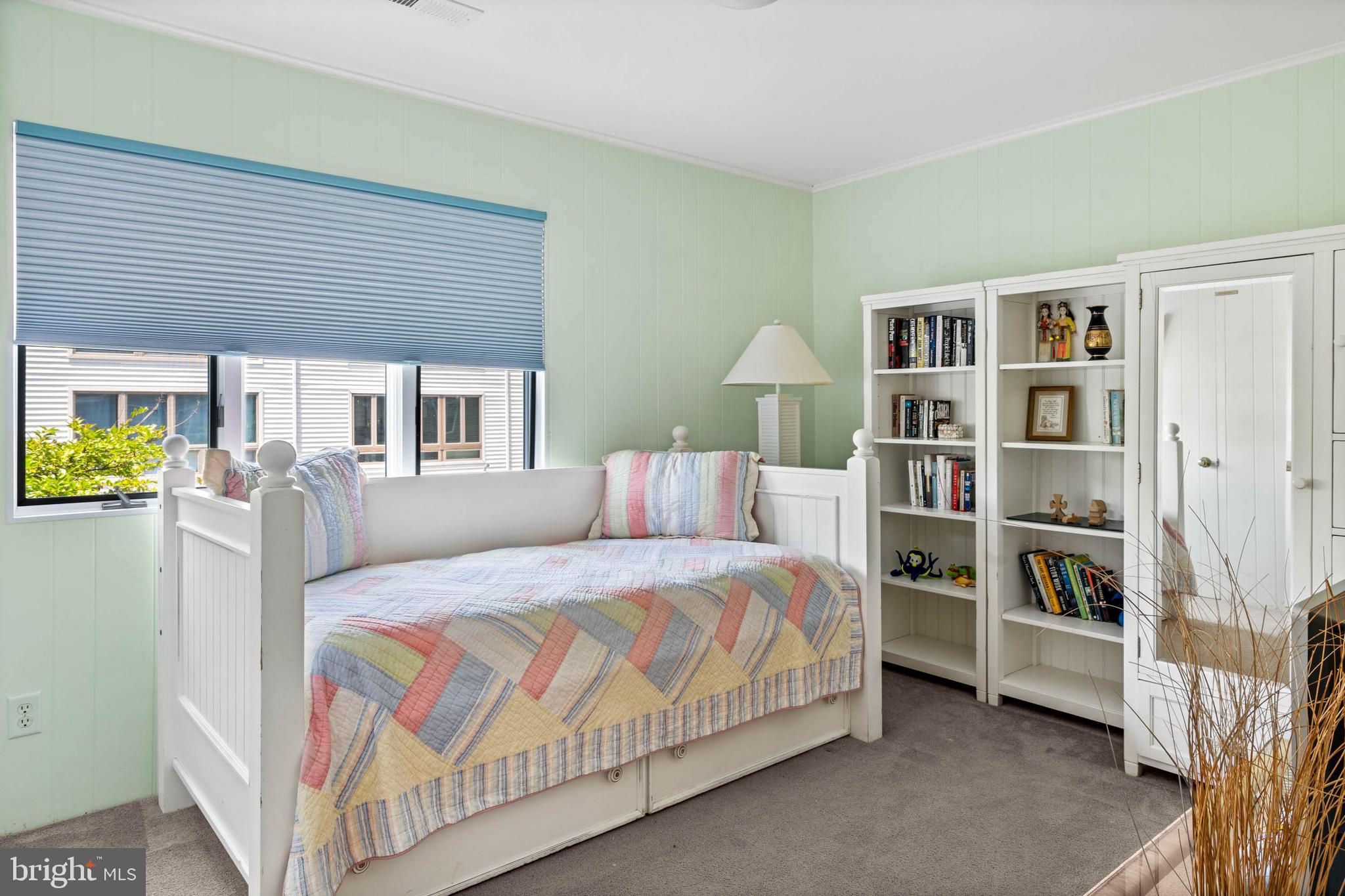 29155 Ocean Road, Unit 4 Bethany Beach, DE 19930 - Photo 24 of 63 Bonus Room with daybed/trundle bed & shelving