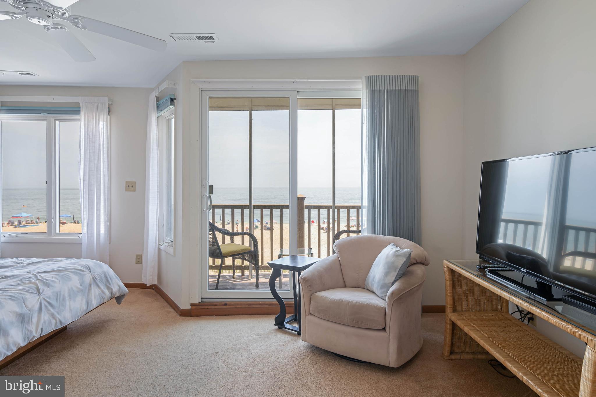 29155 Ocean Road, Unit 4 Bethany Beach, DE 19930 - Photo 30 of 63 Primary Bedroom Sitting area and Deck