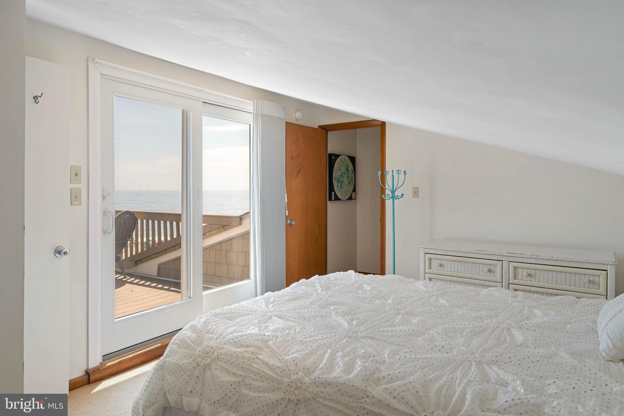 29155 Ocean Road, Unit 4 Bethany Beach, DE 19930 - Photo 42 of 63 Top Floor Guest Bedroom with Queen Bed, Deck