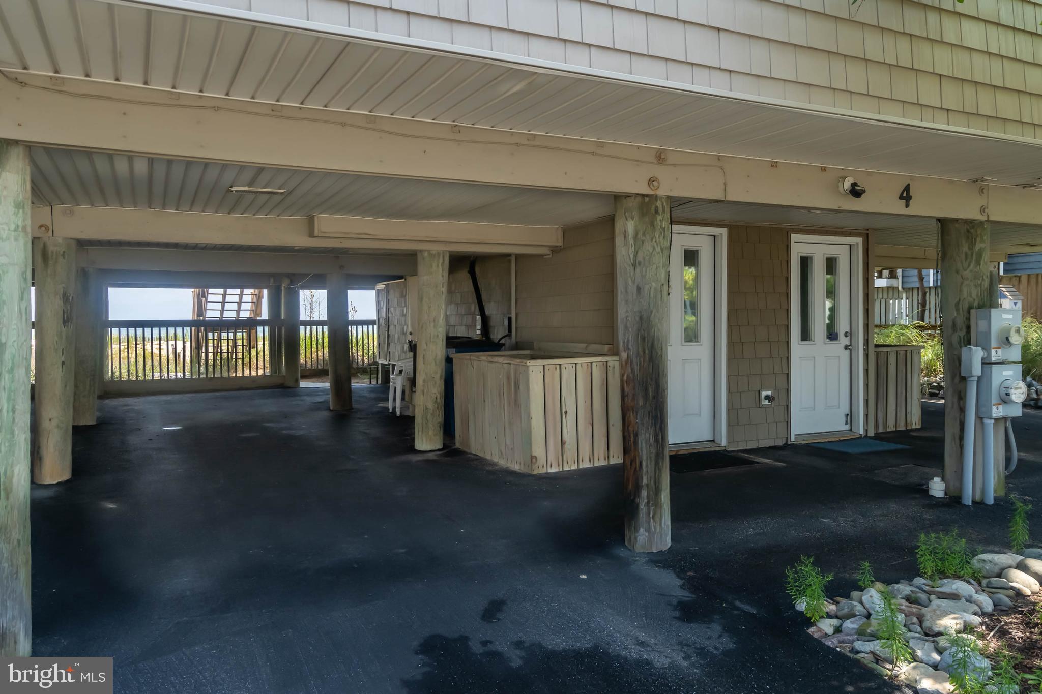 29155 Ocean Road, Unit 4 Bethany Beach, DE 19930 - Photo 8 of 63 3 Stacked Parking Spaces in driveway