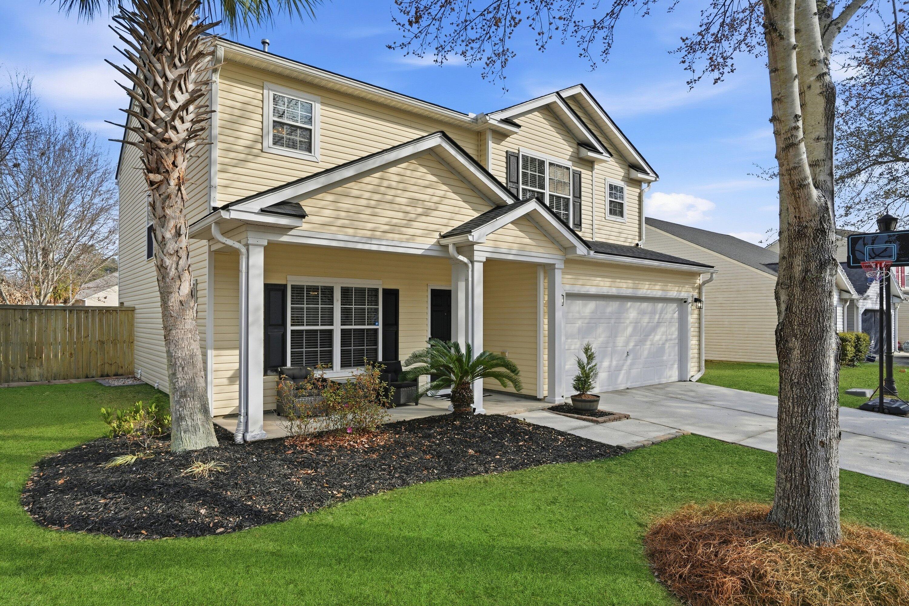 9657 South Carousel Circle Summerville, SC 29485 - Photo 2 of 51 007_DSC03285_grass_83c94d63-3fa5-4dcf-95