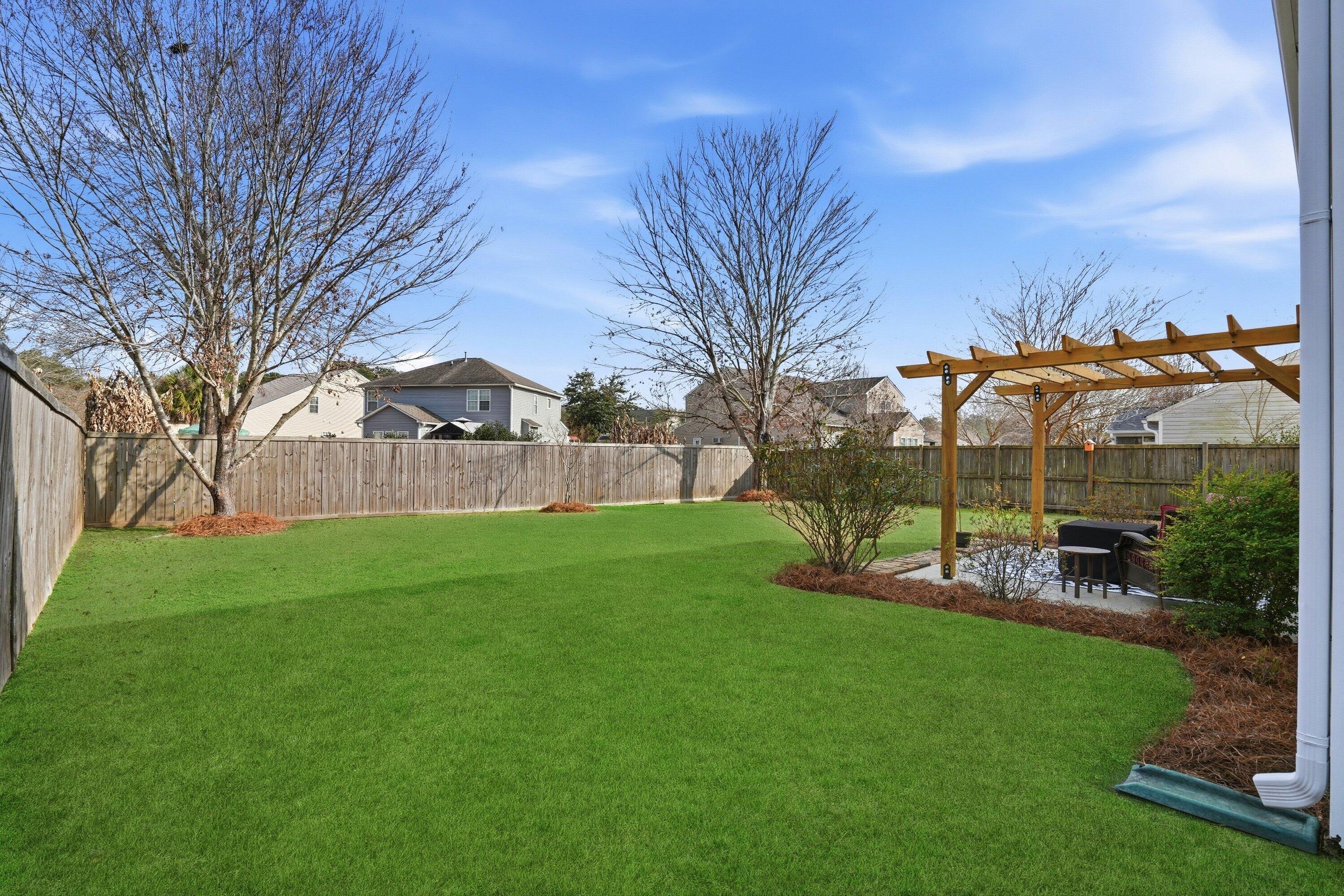 9657 South Carousel Circle Summerville, SC 29485 - Photo 33 of 51 041_DSC03270_grass_67cdf440-3605-4c15-a4